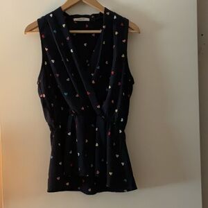Navy blue blouse with hearts by Jessy from Mod Cloth.